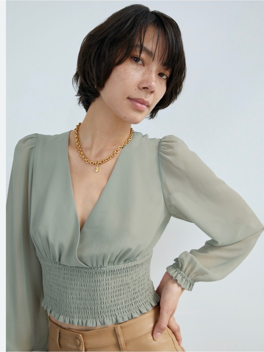 Aritzia Wistful Sage Green Smocked-Waist V-Neck Blouse - Picture 2 of 7